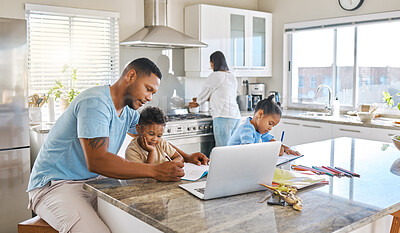 Buy stock photo Shot of parents helping their children with homework at home