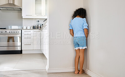 Buy stock photo Shot of a little girl standing in the corner at home