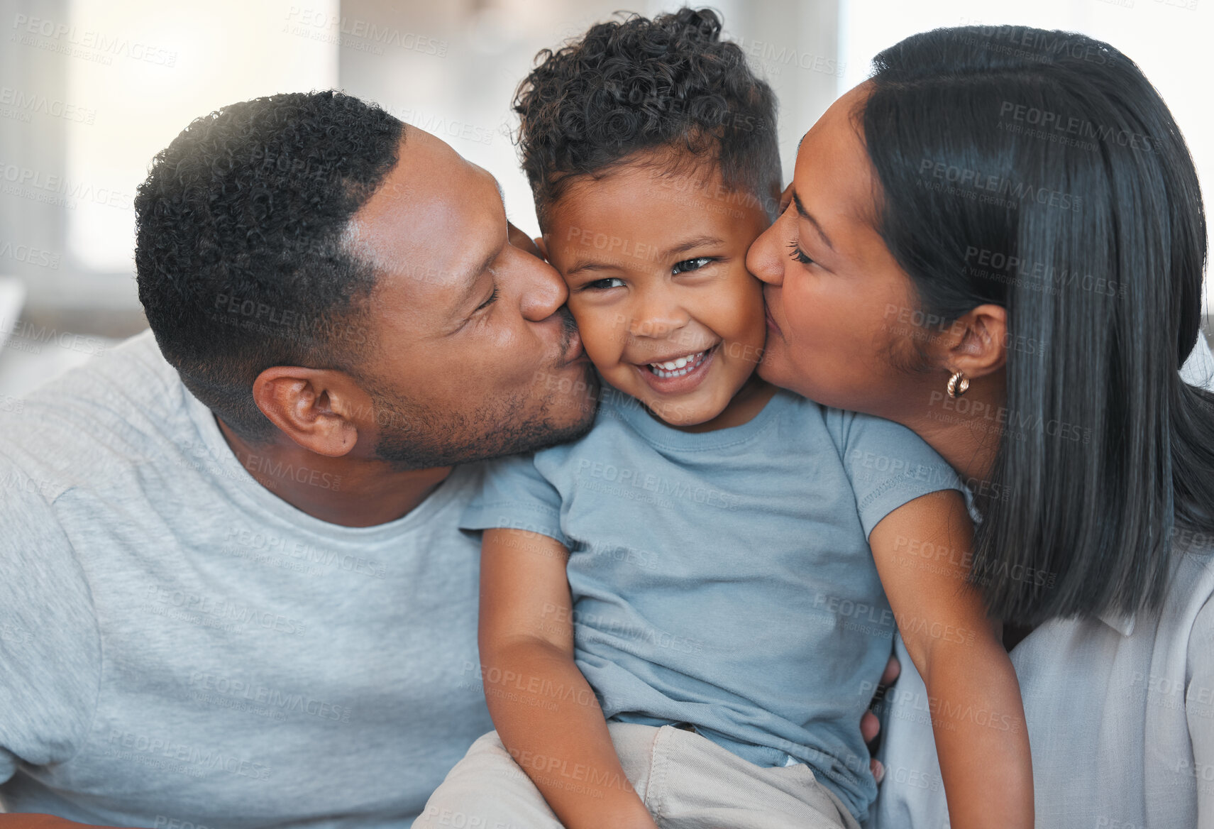 Buy stock photo Parents, child and smile with kiss in home with bonding, connection or affection with support or play. Happy family, people and boy kid in house with relax, love and relationship for security or care