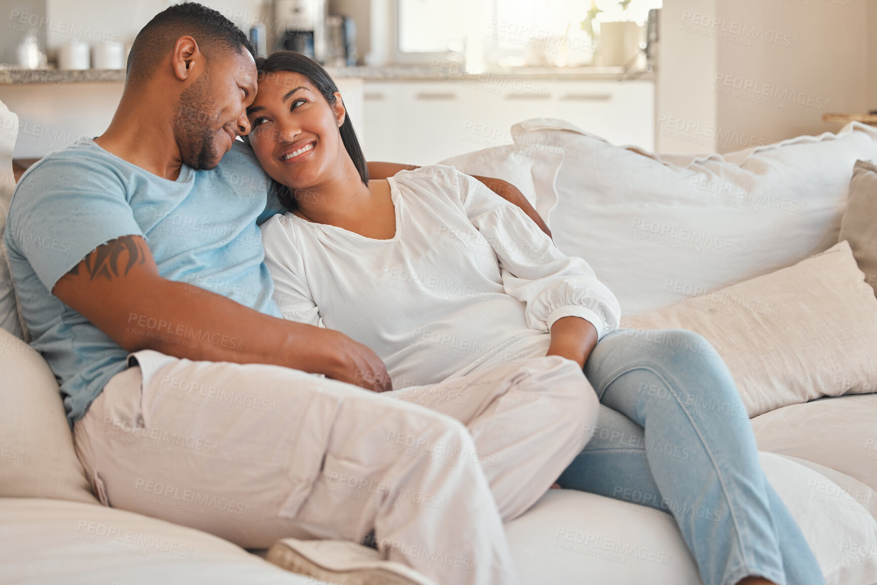 Buy stock photo Sofa, couple and happy in living room to relax with bonding, support and care at home. People, relationship and smile with affection on couch in lounge for break, love and chilling with peace
