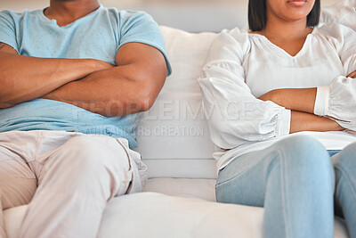 Buy stock photo Arms crossed, couple and arguing in home on sofa for disagreement, problems and unhappy. Relationship, people and conflict or upset in living room on couch with toxic conversation and communication