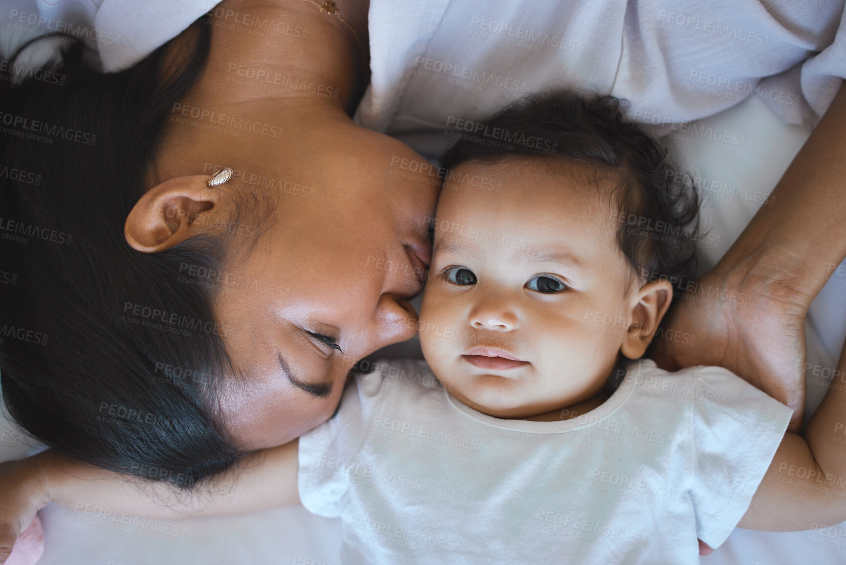 Buy stock photo Bonding, mom and baby in morning, relax and love for child, family and together with newborn and young. Bed, happy and motherhood for woman, care and affection for infant, parent and mother in home