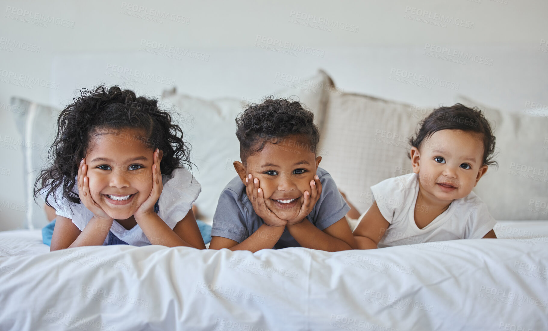 Buy stock photo Siblings, happy and portrait of children in bed with blanket for bonding, love and fun at home. Family, childhood and boy with girl and baby in bedroom for relax, rest and smile together in morning