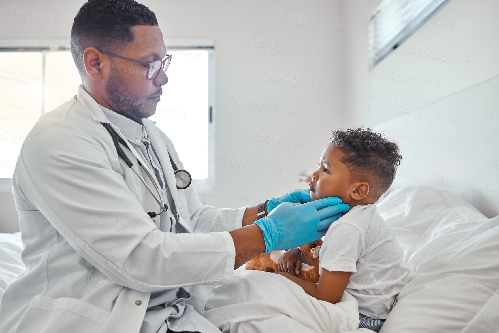 Buy stock photo Doctor, man and check neck of kid for medical assessment, thyroid glands and sore throat of tonsil evaluation. Expert, boy and checkup for lymph nodes inspection, voice exam and healthcare at house
