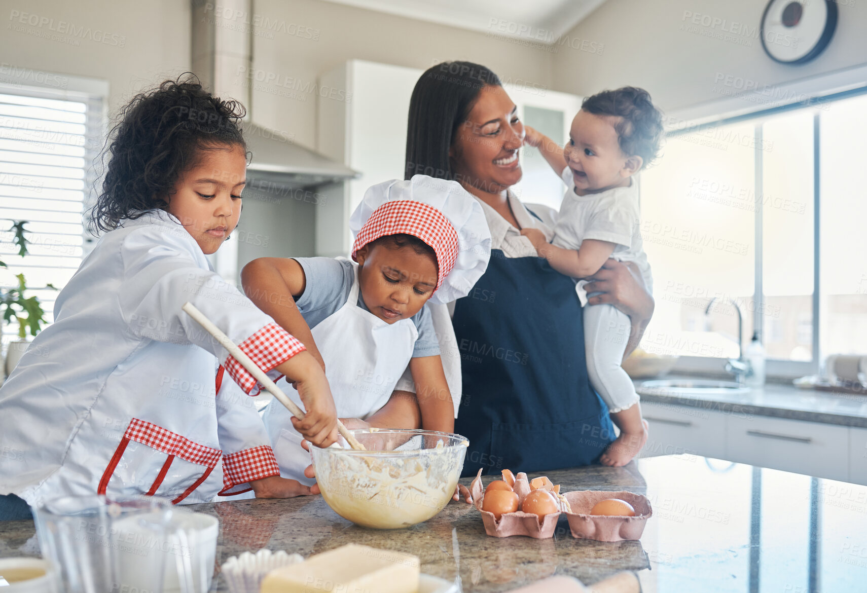 Buy stock photo Baking, playful and mom with children in kitchen for cake, sweet treats and dessert for bonding or relationship. Family, home and mother and kids with ingredients, recipe and learning skills together