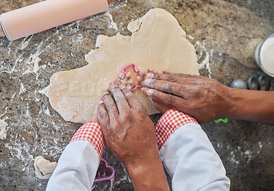 Buy stock photo Father, child and hands in home for baking, family bonding and together for food prep. Kids, biscuit shape and dad with kid for learning to cook in kitchen, dough and ingredients for pastry snack