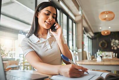 Buy stock photo Girl, student and phone call at coffee shop with writing notes for exam, assessment and remote e learning. Woman, person and education with book, solution and advice for university test at cafeteria