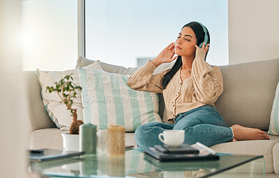 Buy stock photo Woman, headphones and sound for thinking in home, streaming and listen to podcast for reflection. Female person, hearing playlist and lounge for perspective on future, weekend nostalgia and memory