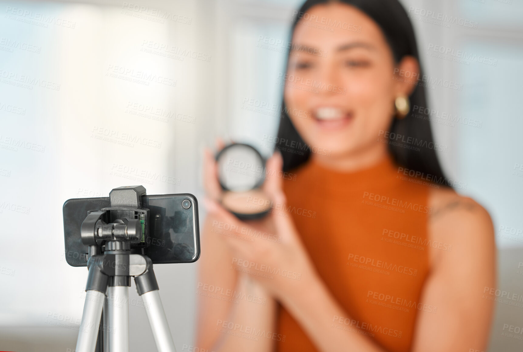 Buy stock photo Live streaming, makeup and woman with phone on tripod in home for broadcast, content creation and closeup. Beauty Influencer, cosmetics and recording video on mobile for product promotion or tutorial