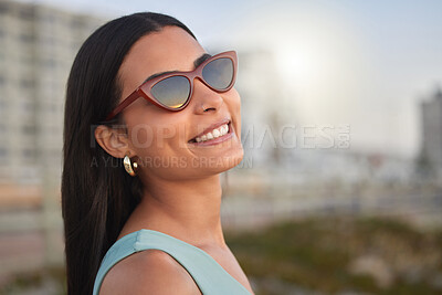 Buy stock photo Shot of a beautiful young woman enjoying some time at the beach