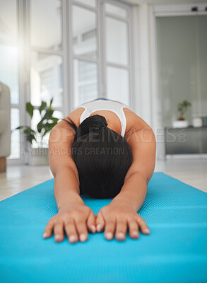 Buy stock photo Yoga, stretching and child pose with woman in living room for health, fitness and mindfulness workout. Wellness exercise, strong and warm up with person and home gym for pilates, calm and balance