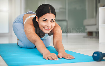 Buy stock photo Yoga, portrait and child pose with woman in living room for health, fitness and mindfulness workout. Wellness exercise, strong and warm up with person and home gym for pilates, calm and balance