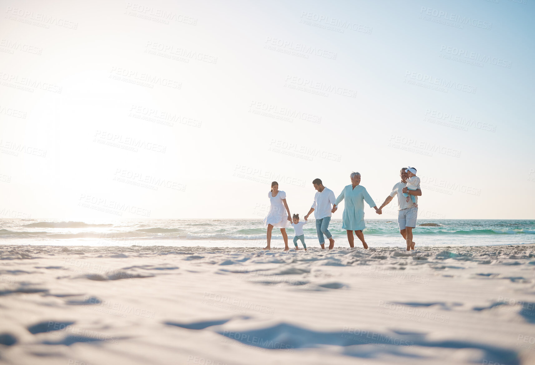 Buy stock photo Big family, holding hands and holiday on beach with mockup space for weekend or vacation. Grandparents, parents and kids walking together on the ocean coast for fun bonding or quality time in nature
