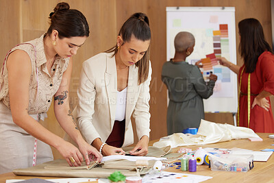 Buy stock photo Shot of a group of female designers working in an office