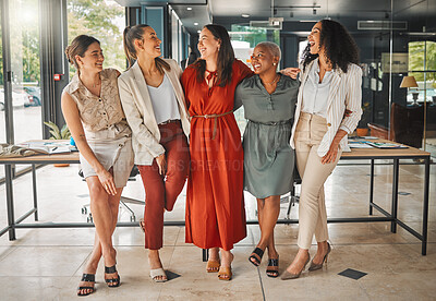 Buy stock photo Shot of a group of female designers standing in an office