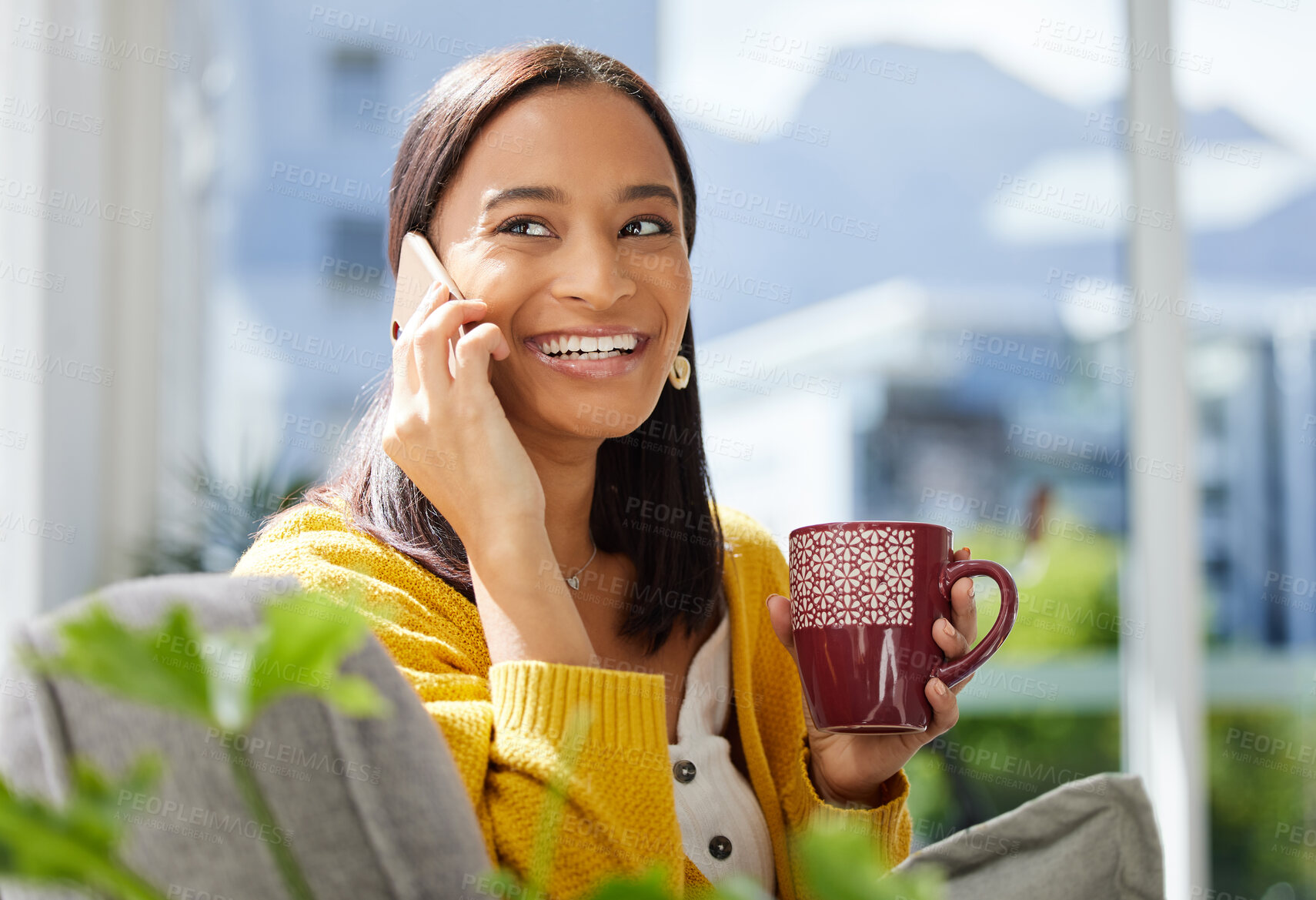 Buy stock photo Shot of a young woman on a call at home