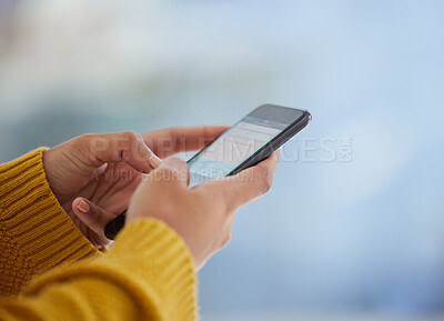 Buy stock photo Shot of an unrecognizable person using a phone at home