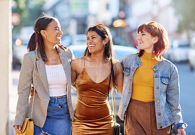 Buy stock photo Cropped shot of three attractive young girlfriends out on the town