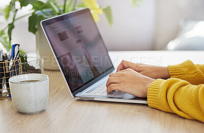 Buy stock photo Shot of an unrecognizable businessperson using a laptop at work