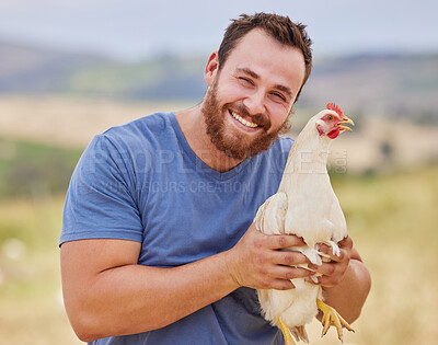 Buy stock photo Portrait of a young man working on a poultry farm