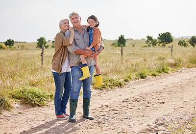 Buy stock photo Shot of an adorable little girl on a farm with her grandparents