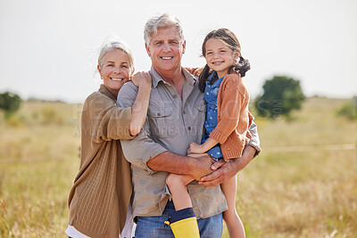 Buy stock photo Shot of an adorable little girl on a farm with her grandparents