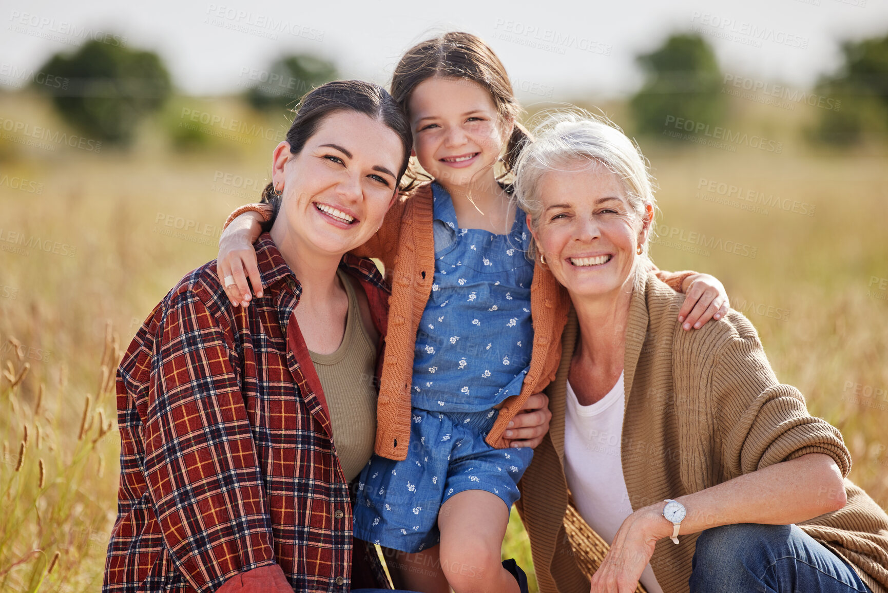 Buy stock photo Portrait, nature and child with mother and grandmother for teaching of sustainable or eco friendly farm. Outdoor, bonding and happy girl kid hug mom and senior woman on organic field in countryside.