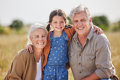 Buy stock photo Shot of an adorable little girl on a farm with her grandparents