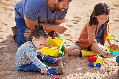 Buy stock photo Dad, children and toys in sand outdoor for bonding together, curious learning and cognitive development. Man, girls and plastic truck on farm for motor skills, exploring or imaginative play in nature