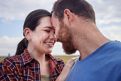 Buy stock photo Shot of a couple standing together outside