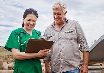 Buy stock photo Shot of a veterinarian talking to a mature man on his farm