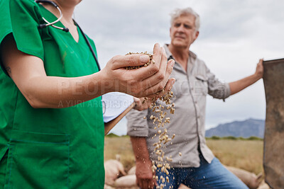 Buy stock photo Shot of a veterinarian talking to a mature man on his farm