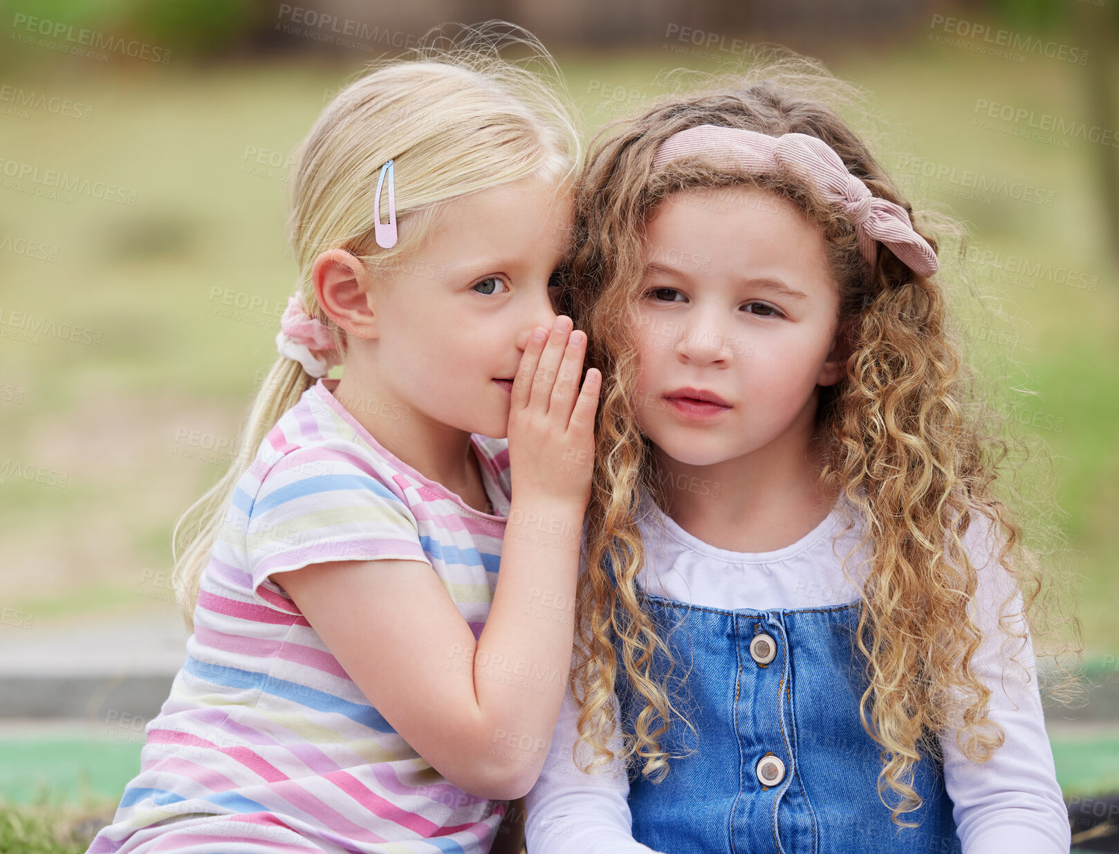 Buy stock photo Children, whisper and outdoor secret in nature, girls friendship and gossip communication. Playground, share story and kids with confidential information, park news and together for social privacy
