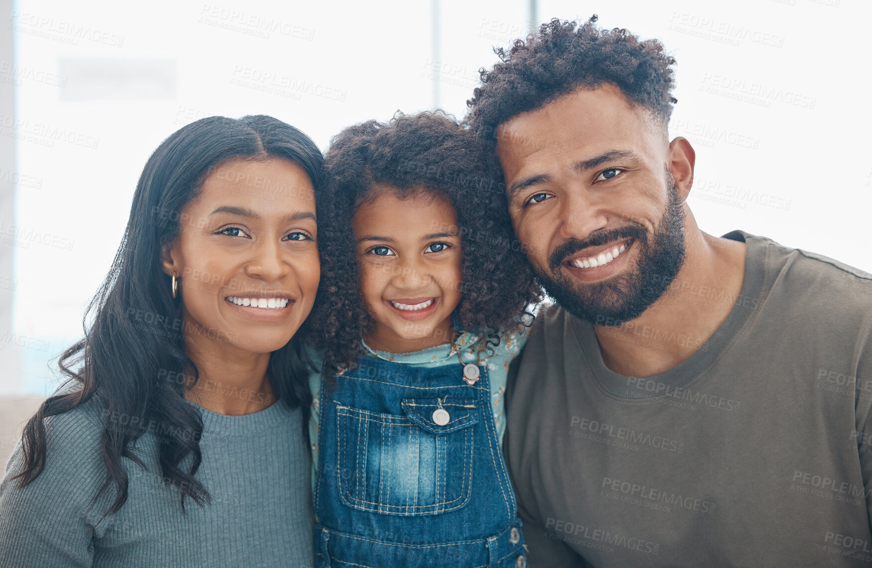 Buy stock photo Home, parents and girl in portrait for hug, connection and bonding together as happy family. House, mother and father with child for love embrace, comfortable and relax with smile in apartment