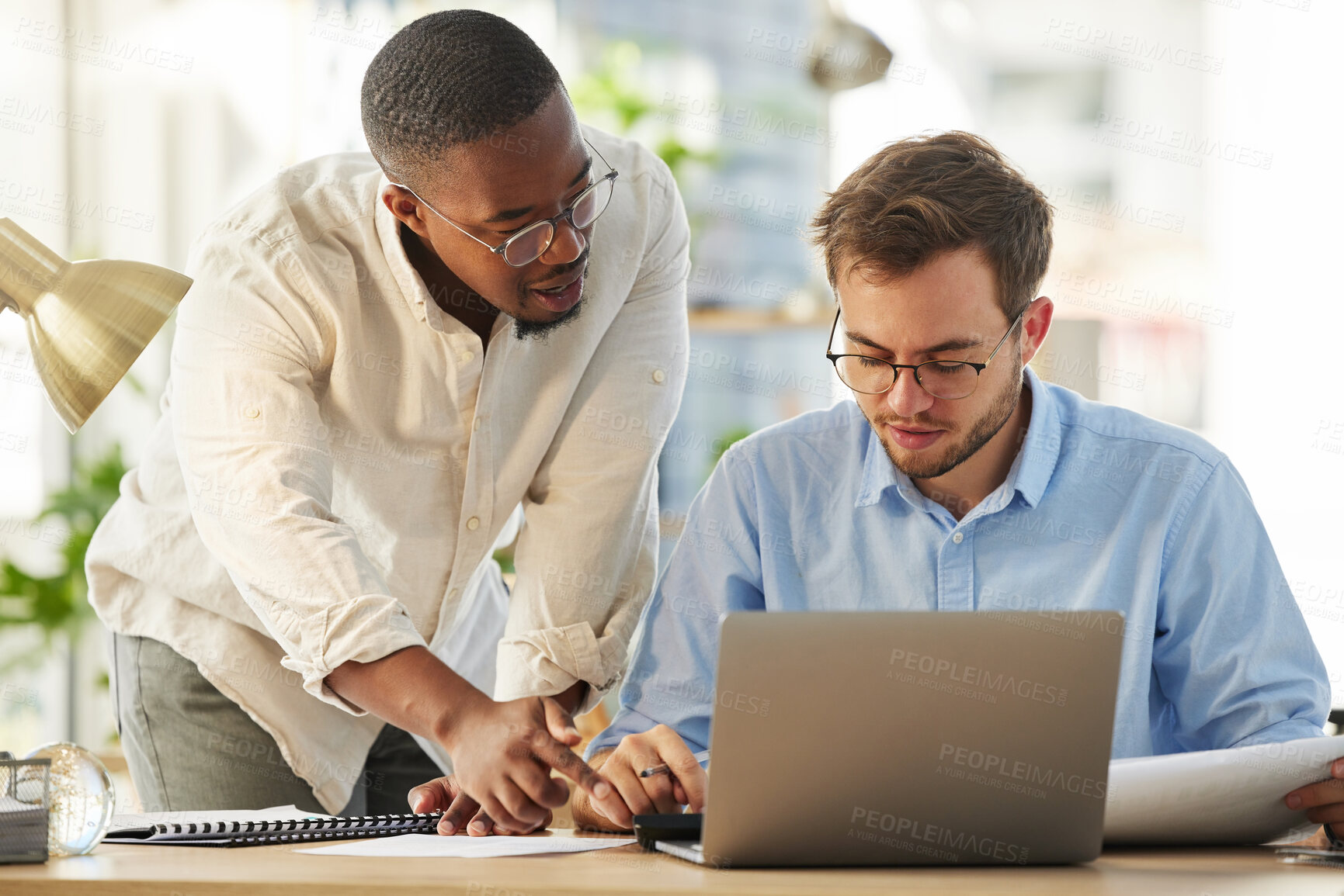 Buy stock photo Laptop, black man or manager coaching a worker with notes or research project in digital agency. Paperwork, boss or person helping, training or speaking of SEO data or online business to employee 