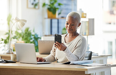 Buy stock photo Shot of a young businesswoman using her smartphone to send a text message