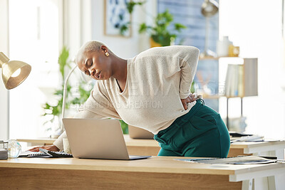 Buy stock photo Black woman, back pain and stress at startup, office and exhausted with strain, stretching and spine injury. Person, writer and muscle fatigue with burnout by laptop in workplace at creative agency