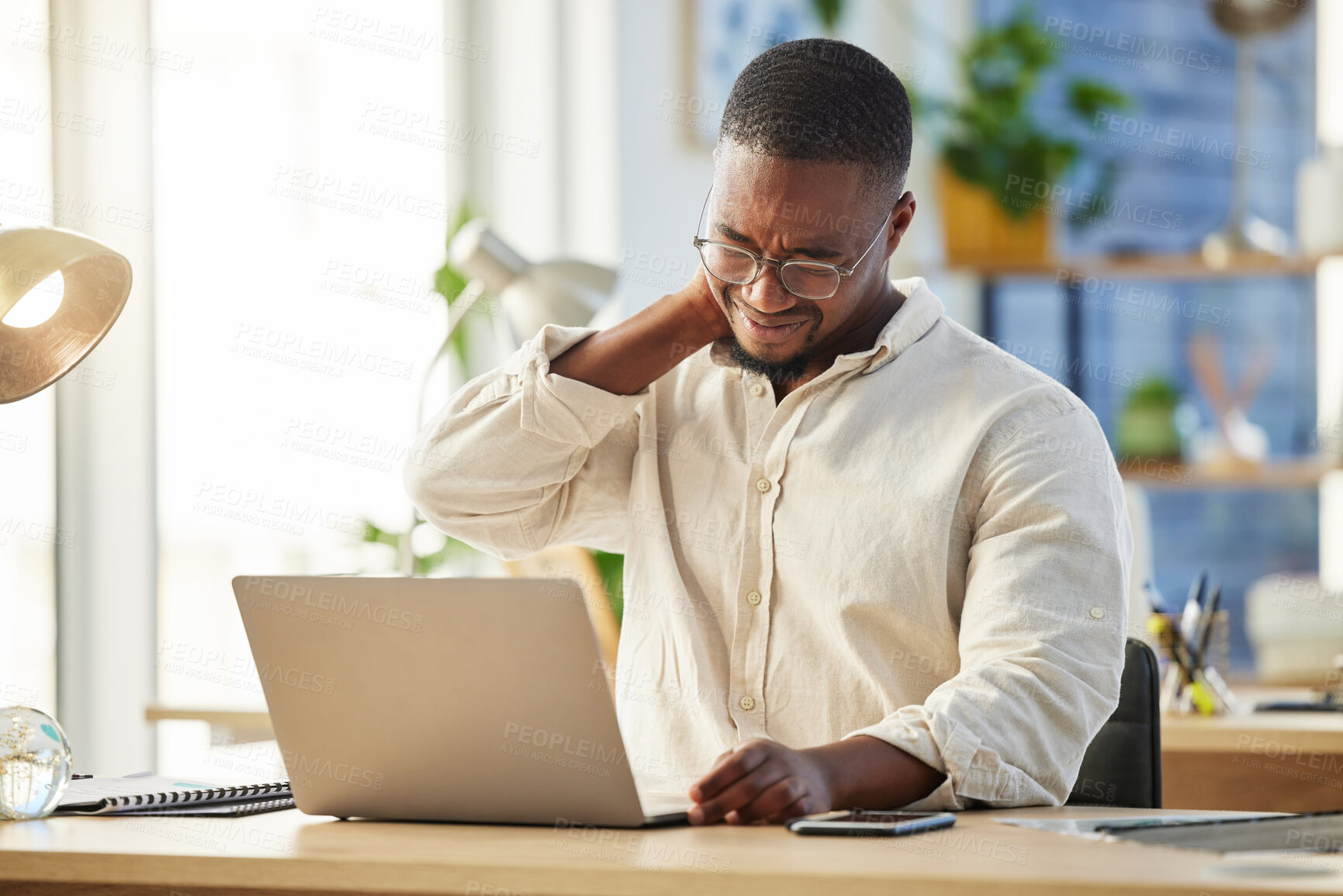 Buy stock photo African business man, neck pain and laptop with burnout, stress and muscle injury at desk in web design job. Developer, black businessman and entrepreneur with computer with fatigue in modern office