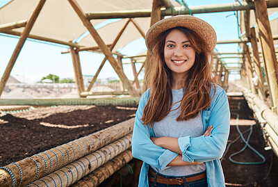 Buy stock photo Farming portrait, woman and arms crossed in greenhouse for land development, food production or agriculture. Farmer, person and happy in garden for soil inspection, confidence or sustainable business