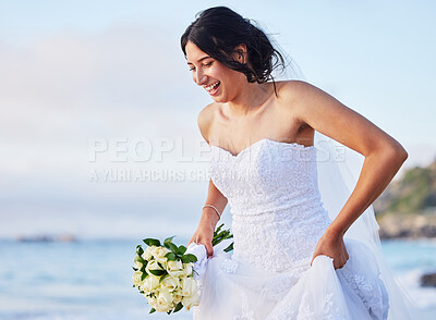 Buy stock photo Shot of a beautiful woman on the beach on her wedding day