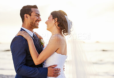 Buy stock photo Wedding day, beach and couple hug at ocean for love, union and celebration on nature background. Summer, marriage and happy groom with bride embracing at sea ceremony, smile and romantic in Hawaii