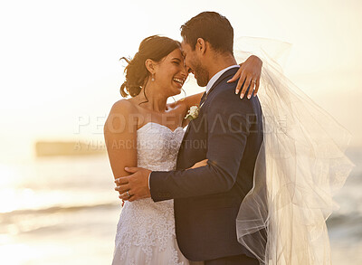 Buy stock photo Wedding, beach and couple hug at sunset for love, union and celebration against a nature background. Summer, marriage and happy groom with bride embracing at sea ceremony, smile and romantic in Miami