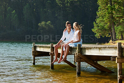 Buy stock photo Lake, love and couple on vacation, summer and break for quality time, bonding and loving together. Romance, man and woman in nature, forest and romantic getaway for rest, relationship and happiness