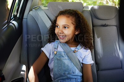 Buy stock photo Road trip, girl child and happy in car backseat for travel, journey and drive, happy and relax. Smile, kid and little passenger enjoying drive in vehicle for adventure, vacation or  weekend traveling
