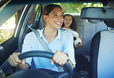 Buy stock photo Cropped shot of an attractive young woman driving a car with her daughter in the backseat
