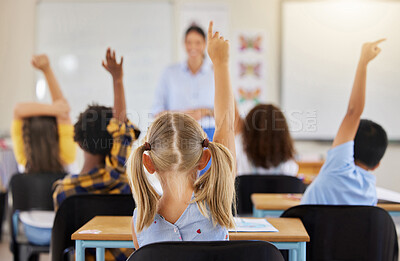 Buy stock photo Answering, back and children raising hand in class for a question, answer or vote at school. Teaching, academic and a student asking a teacher questions while learning, volunteering or voting