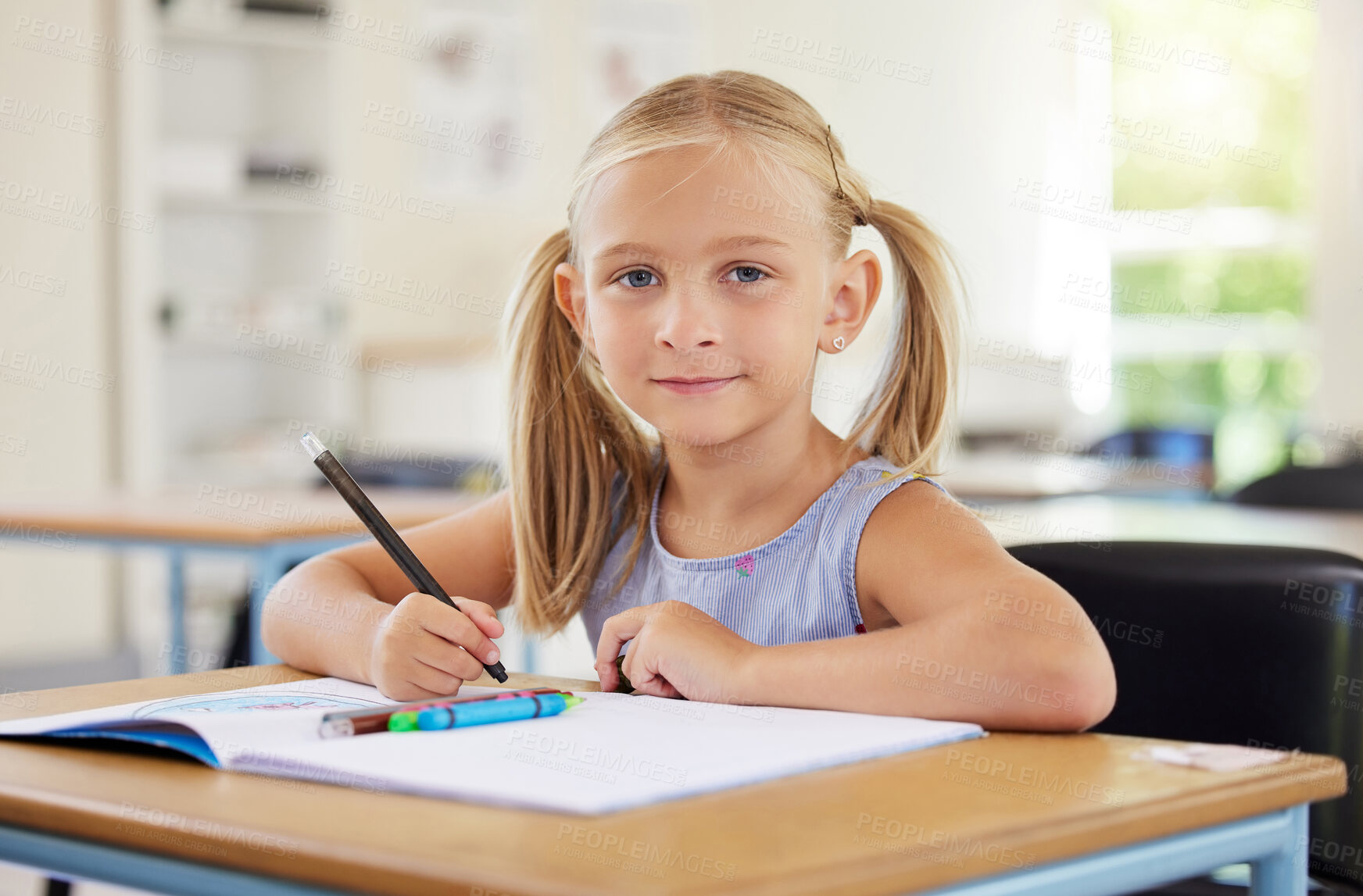 Buy stock photo Education, drawing and portrait of girl in classroom learning, exam or studying with book. Preschool, development or confident kid or student from Canada with creative art in notebook in kindergarten