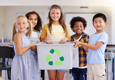 Buy stock photo Children, recycle bin and portrait in classroom for cleaning, climate change or eco friendly in school. Recycling, learning and education smile with happy group of students or friends in kindergarten