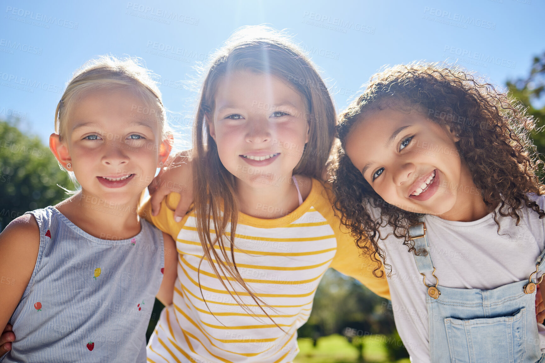 Buy stock photo Happy, friendship and portrait of children in a park playing together outdoor in nature. Happiness, diversity and girl kid friends with smile standing, embracing and bonding in a outside green garden