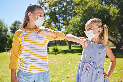 Buy stock photo Elbow greeting, covid and kids outdoor together for social distance, prevention or safety. Girls, park and friends bump elbows with children in face mask for hello and solidarity at school in summer